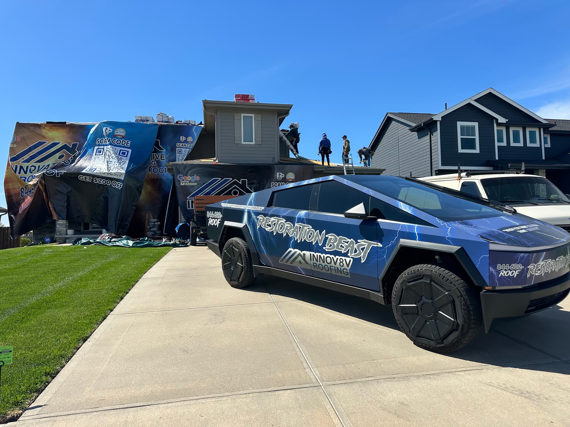 Innov8v Roofing Restoration Beast wrapped Cybertruck at an active job site with QR banner