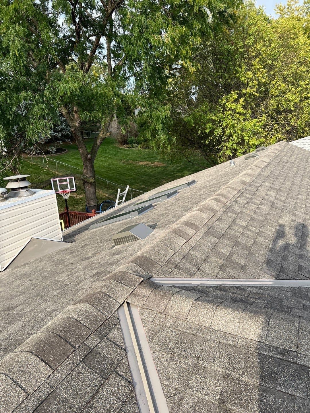 Close-up of a properly formed shingle roof valley